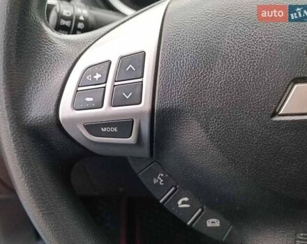 Червоний Міцубісі Lancer, об'ємом двигуна 2 л та пробігом 136 тис. км за 10990 $, фото 19 на Automoto.ua