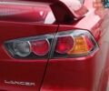 Червоний Міцубісі Lancer, об'ємом двигуна 2 л та пробігом 136 тис. км за 10990 $, фото 9 на Automoto.ua