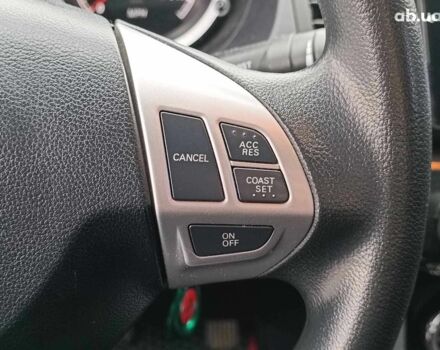 Красный Мицубиси Лансер, объемом двигателя 2 л и пробегом 136 тыс. км за 10990 $, фото 20 на Automoto.ua