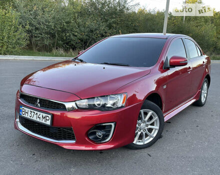 Червоний Міцубісі Lancer, об'ємом двигуна 2 л та пробігом 140 тис. км за 9900 $, фото 1 на Automoto.ua