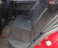 Червоний Міцубісі Lancer, об'ємом двигуна 2 л та пробігом 136 тис. км за 10990 $, фото 11 на Automoto.ua