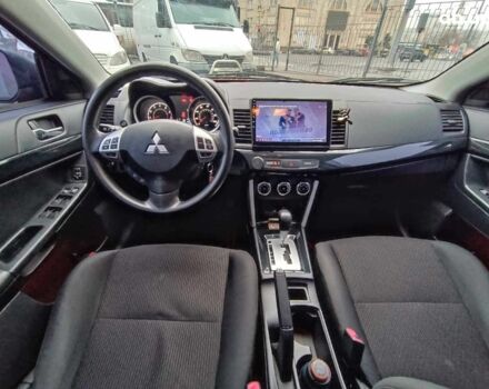 Красный Мицубиси Лансер, объемом двигателя 2 л и пробегом 136 тыс. км за 10990 $, фото 24 на Automoto.ua