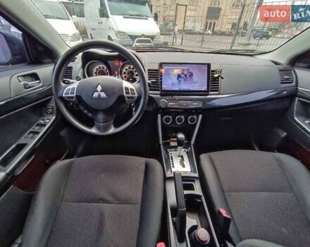 Червоний Міцубісі Lancer, об'ємом двигуна 2 л та пробігом 136 тис. км за 10990 $, фото 24 на Automoto.ua