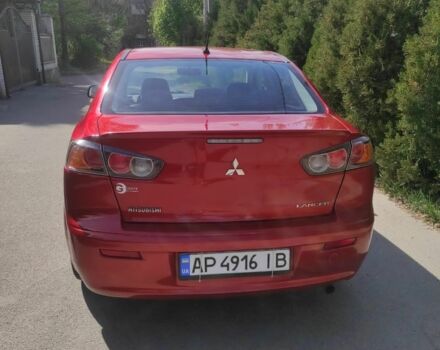 Червоний Міцубісі Lancer, об'ємом двигуна 2 л та пробігом 108 тис. км за 9000 $, фото 5 на Automoto.ua