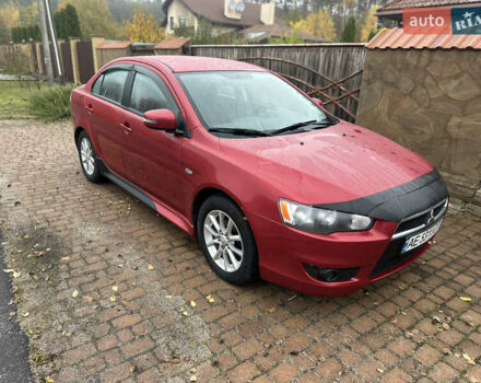 Красный Мицубиси Лансер, объемом двигателя 2 л и пробегом 70 тыс. км за 7950 $, фото 6 на Automoto.ua