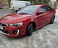 Червоний Міцубісі Lancer, об'ємом двигуна 2.36 л та пробігом 140 тис. км за 10500 $, фото 1 на Automoto.ua
