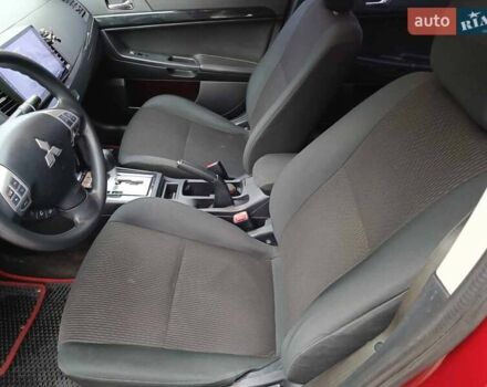 Червоний Міцубісі Lancer, об'ємом двигуна 2 л та пробігом 136 тис. км за 10990 $, фото 15 на Automoto.ua