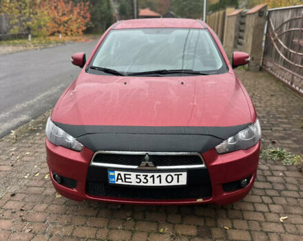 Красный Мицубиси Лансер, объемом двигателя 2 л и пробегом 70 тыс. км за 7950 $, фото 4 на Automoto.ua