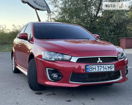 Червоний Міцубісі Lancer, об'ємом двигуна 2 л та пробігом 140 тис. км за 9900 $, фото 28 на Automoto.ua