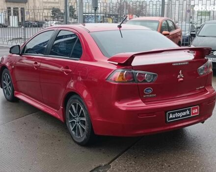 Красный Мицубиси Лансер, объемом двигателя 2 л и пробегом 136 тыс. км за 10990 $, фото 6 на Automoto.ua