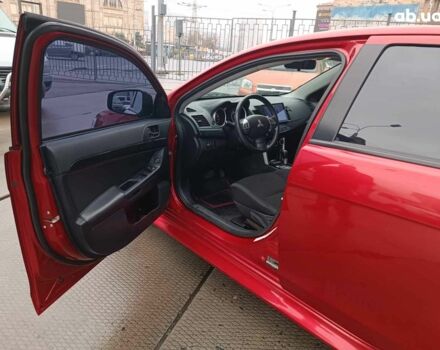 Красный Мицубиси Лансер, объемом двигателя 2 л и пробегом 136 тыс. км за 10990 $, фото 13 на Automoto.ua