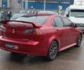 Красный Мицубиси Лансер, объемом двигателя 2 л и пробегом 136 тыс. км за 10990 $, фото 10 на Automoto.ua