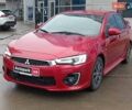 Червоний Міцубісі Lancer, об'ємом двигуна 2 л та пробігом 136 тис. км за 10990 $, фото 1 на Automoto.ua