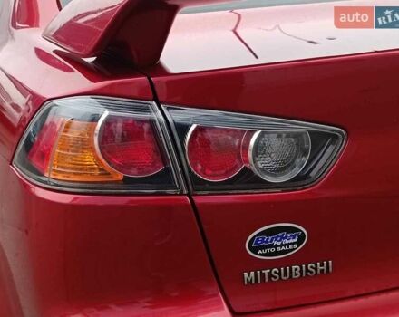 Червоний Міцубісі Lancer, об'ємом двигуна 2 л та пробігом 136 тис. км за 10990 $, фото 7 на Automoto.ua