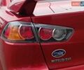 Червоний Міцубісі Lancer, об'ємом двигуна 2 л та пробігом 136 тис. км за 10990 $, фото 7 на Automoto.ua