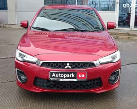Красный Мицубиси Лансер, объемом двигателя 2 л и пробегом 136 тыс. км за 10990 $, фото 1 на Automoto.ua