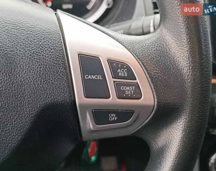 Червоний Міцубісі Lancer, об'ємом двигуна 2 л та пробігом 136 тис. км за 10990 $, фото 21 на Automoto.ua