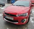 Червоний Міцубісі Lancer, об'ємом двигуна 2 л та пробігом 196 тис. км за 9250 $, фото 1 на Automoto.ua