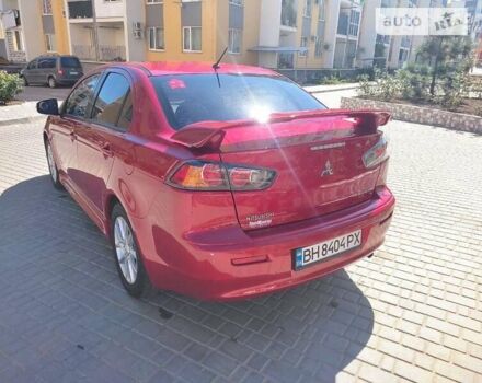 Червоний Міцубісі Lancer, об'ємом двигуна 2 л та пробігом 120 тис. км за 7500 $, фото 5 на Automoto.ua