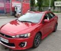 Червоний Міцубісі Lancer, об'ємом двигуна 2 л та пробігом 86 тис. км за 11500 $, фото 1 на Automoto.ua