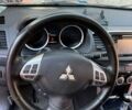Красный Мицубиси Лансер, объемом двигателя 2 л и пробегом 145 тыс. км за 9000 $, фото 12 на Automoto.ua