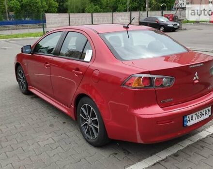 Червоний Міцубісі Lancer, об'ємом двигуна 2 л та пробігом 86 тис. км за 11500 $, фото 5 на Automoto.ua