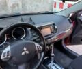 Красный Мицубиси Лансер, объемом двигателя 2 л и пробегом 145 тыс. км за 9000 $, фото 14 на Automoto.ua