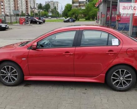 Червоний Міцубісі Lancer, об'ємом двигуна 2 л та пробігом 86 тис. км за 11500 $, фото 6 на Automoto.ua