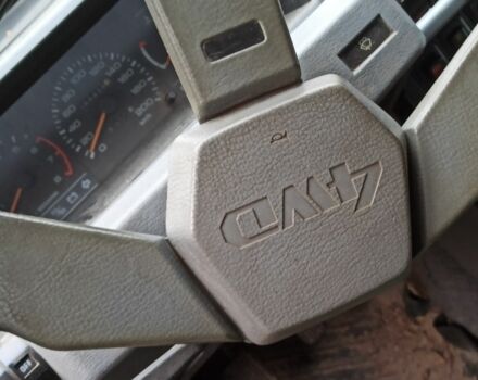 Красный Мицубиси Лансер, объемом двигателя 1.8 л и пробегом 250 тыс. км за 700 $, фото 7 на Automoto.ua