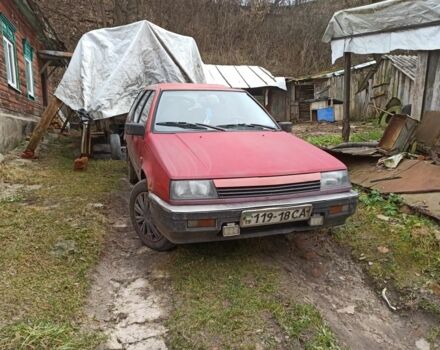 Красный Мицубиси Лансер, объемом двигателя 1.8 л и пробегом 250 тыс. км за 700 $, фото 1 на Automoto.ua