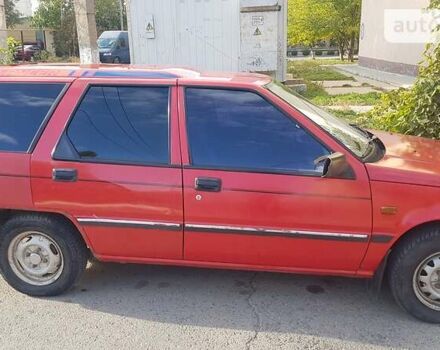 Червоний Міцубісі Lancer, об'ємом двигуна 1.8 л та пробігом 250 тис. км за 2300 $, фото 9 на Automoto.ua