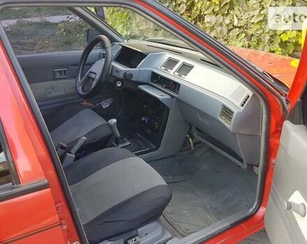 Червоний Міцубісі Lancer, об'ємом двигуна 1.8 л та пробігом 250 тис. км за 2300 $, фото 11 на Automoto.ua