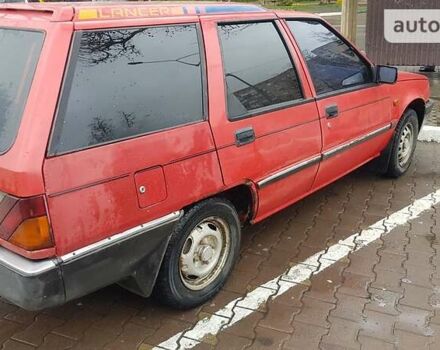 Червоний Міцубісі Lancer, об'ємом двигуна 1.8 л та пробігом 250 тис. км за 2300 $, фото 1 на Automoto.ua