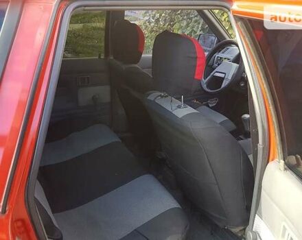 Червоний Міцубісі Lancer, об'ємом двигуна 1.8 л та пробігом 250 тис. км за 2300 $, фото 10 на Automoto.ua