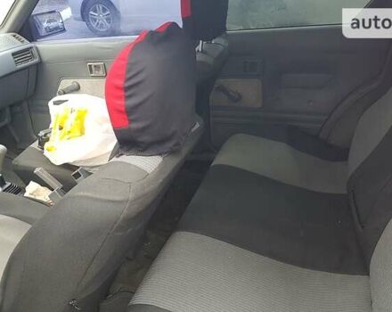 Червоний Міцубісі Lancer, об'ємом двигуна 1.8 л та пробігом 250 тис. км за 2300 $, фото 7 на Automoto.ua