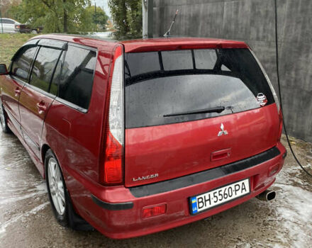 Червоний Міцубісі Lancer, об'ємом двигуна 1.6 л та пробігом 205 тис. км за 4400 $, фото 6 на Automoto.ua