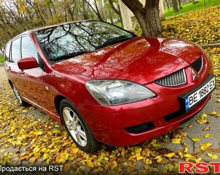 Красный Мицубиси Лансер, объемом двигателя 1.6 л и пробегом 214 тыс. км за 3999 $, фото 2 на Automoto.ua