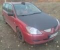 Червоний Міцубісі Lancer, об'ємом двигуна 1.6 л та пробігом 260 тис. км за 3000 $, фото 5 на Automoto.ua