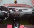 Красный Мицубиси Лансер, объемом двигателя 1.6 л и пробегом 260 тыс. км за 3000 $, фото 5 на Automoto.ua
