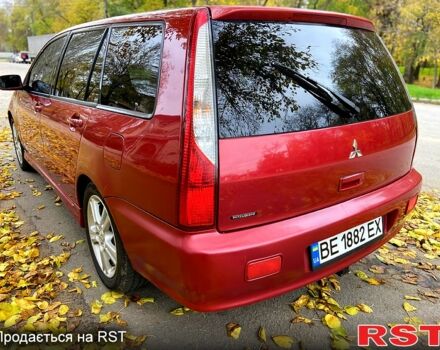 Красный Мицубиси Лансер, объемом двигателя 1.6 л и пробегом 214 тыс. км за 3999 $, фото 5 на Automoto.ua