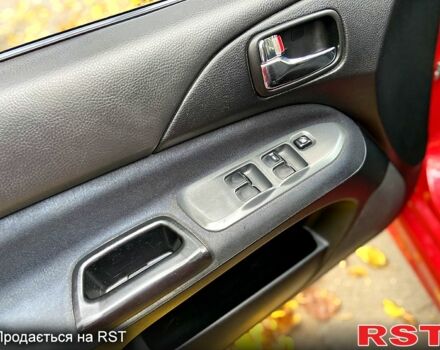 Красный Мицубиси Лансер, объемом двигателя 1.6 л и пробегом 214 тыс. км за 3999 $, фото 8 на Automoto.ua