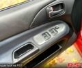 Красный Мицубиси Лансер, объемом двигателя 1.6 л и пробегом 214 тыс. км за 3999 $, фото 8 на Automoto.ua