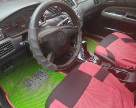 Червоний Міцубісі Lancer, об'ємом двигуна 1.6 л та пробігом 260 тис. км за 3000 $, фото 2 на Automoto.ua