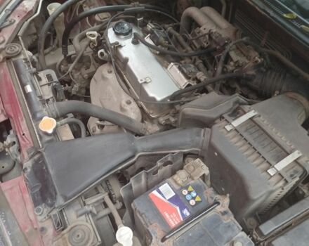 Червоний Міцубісі Lancer, об'ємом двигуна 1.6 л та пробігом 260 тис. км за 3000 $, фото 1 на Automoto.ua