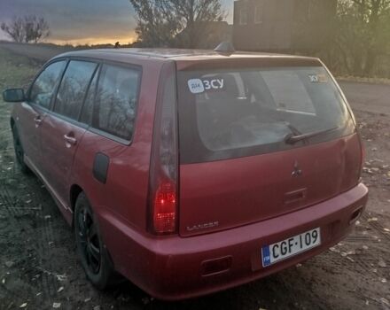 Червоний Міцубісі Lancer, об'ємом двигуна 1.6 л та пробігом 260 тис. км за 3000 $, фото 7 на Automoto.ua