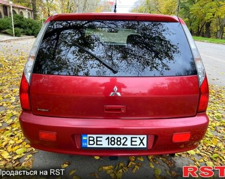 Красный Мицубиси Лансер, объемом двигателя 1.6 л и пробегом 214 тыс. км за 3999 $, фото 4 на Automoto.ua