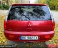 Красный Мицубиси Лансер, объемом двигателя 1.6 л и пробегом 214 тыс. км за 3999 $, фото 4 на Automoto.ua