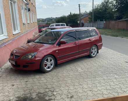 Червоний Міцубісі Lancer, об'ємом двигуна 1.6 л та пробігом 205 тис. км за 4400 $, фото 7 на Automoto.ua