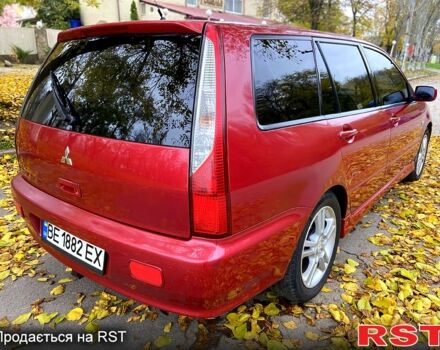 Красный Мицубиси Лансер, объемом двигателя 1.6 л и пробегом 214 тыс. км за 3999 $, фото 3 на Automoto.ua