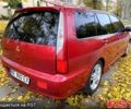 Красный Мицубиси Лансер, объемом двигателя 1.6 л и пробегом 214 тыс. км за 3999 $, фото 3 на Automoto.ua